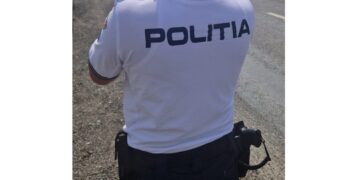 Reținut de polițiști pentru lovire
