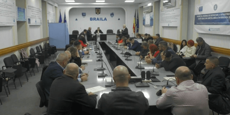 O nouă practică la CJ Brăila: dacă apar în urnă mai multe buletine de vot decât numărul consilierilor prezenți, se scutură bine urna și se votează din nou. Ce mare scofală?